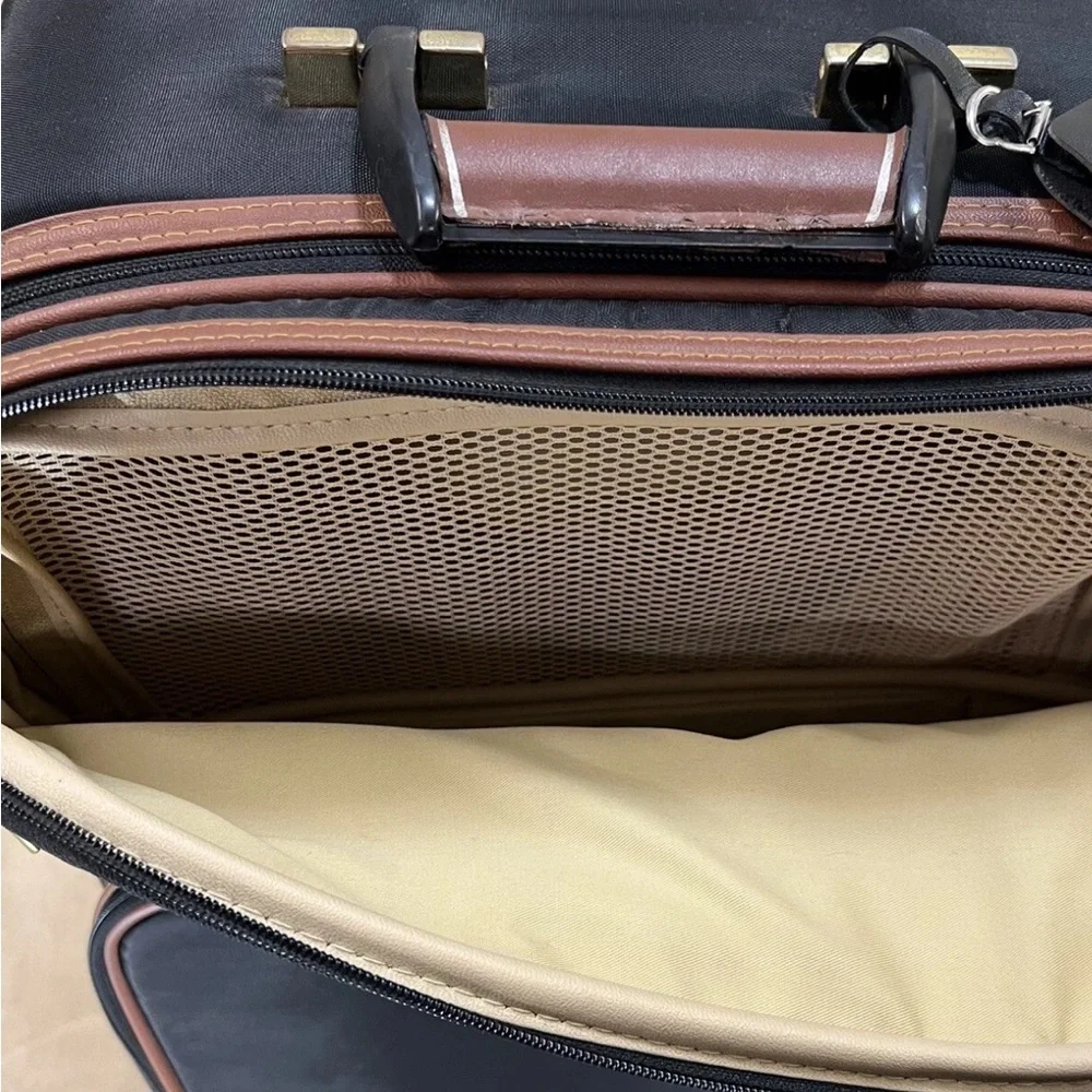 Luxurious Black and Brown Travel Bag with Multicolor Accents